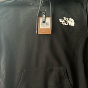 The North face brand NWT men’s size medium black hooded sweatshirt